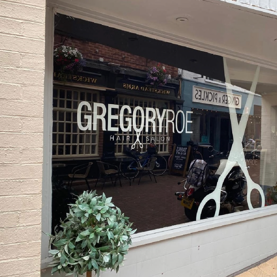 Simplistic, modern window graphics for hairdressers